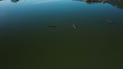 aerial view of crew member rowing her boat