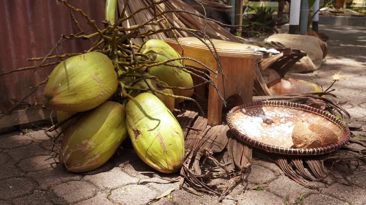 Mahe, Seychelles, 22.09.24, Tourism Festival week 2024, in town Victoria, showcase of grated coconut equipment use for grating coconut 30fps.