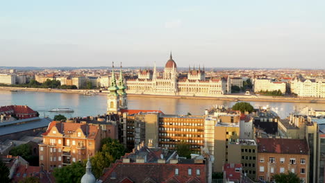 cinematic drone shot of the hungarian parliament building and crown jewels in budapest hungary