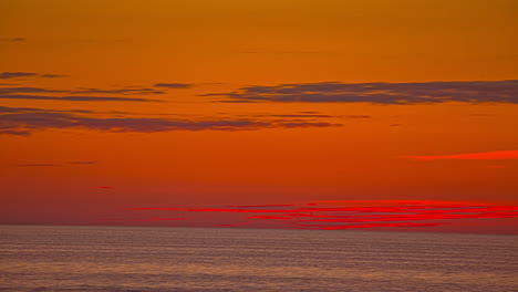 fiery sky with red, orange and yellow colors, nature background seascape view