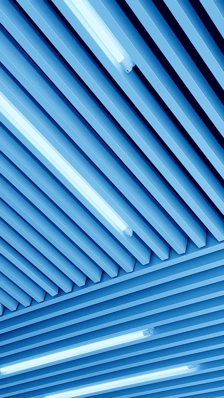 Led lamps on the unusual ceiling. Day light switched on. Low angle view. Vertical video