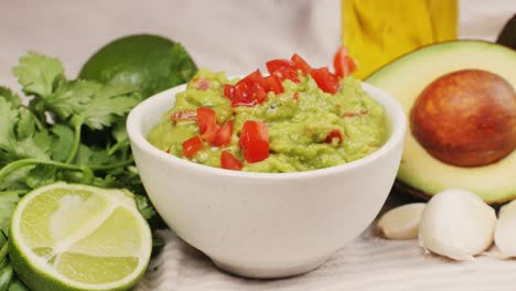 guacamole with avocado, tomato and lime