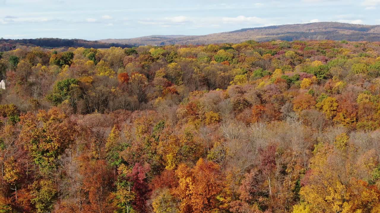 Rising aerial of rolling hills, mountains, valleys in USA