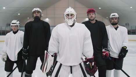 Portrait Of Male Hockey Players In Helmets