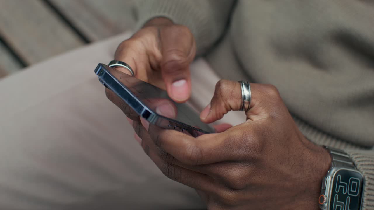 Person using a smartphone outdoors