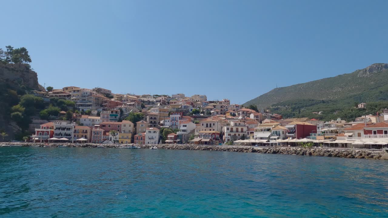 Picturesque houses on hill of seaside town of Parga, Greece