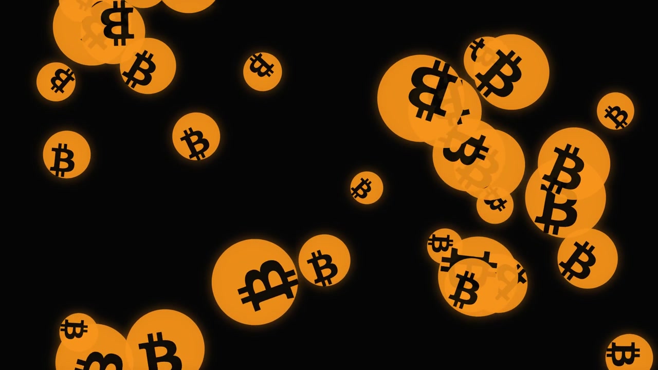 Bitcoin Cryptocurrency Symbols Falling Against a Black Background