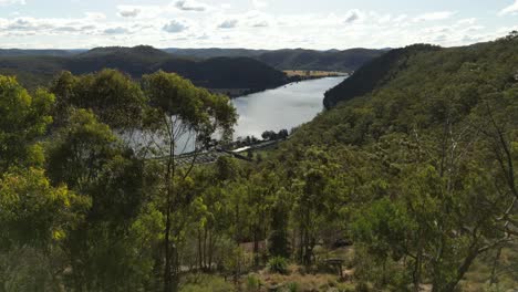 A-slower-lift-up-and-reveal-of-the-beautiful-Hawkesbury-River-in-Australia-from-Hawkins-Lookout-nearby
