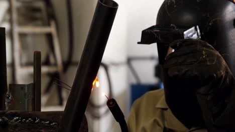 Welder-welding-a-metal