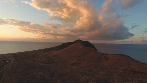 sunset over a coastal hill