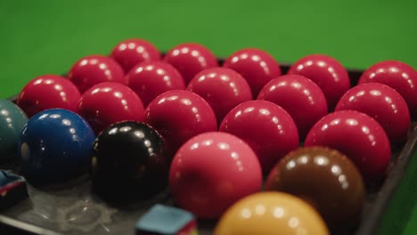 snooker colorful balls close-up on green billiards table for start to play. snooker game. billiard balls with numbers on a pool table. billiards team sport.high quality 4k footage