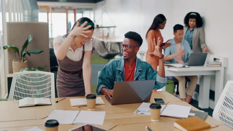 Teamwork,-laptop-and-business-people-fist-bump