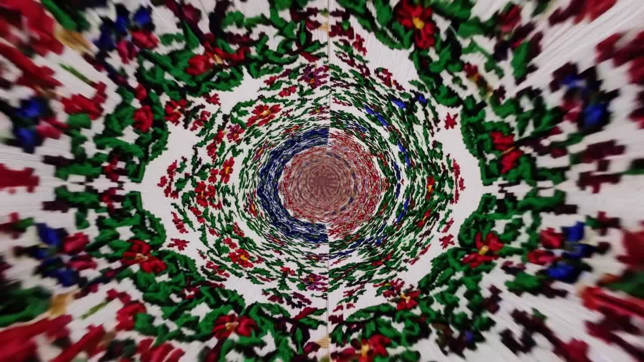 Spiraling floral pattern transitions through vibrant colors, showcasing a dynamic motion sequence of intricate designs and textures, creating a mesmerizing visual experience