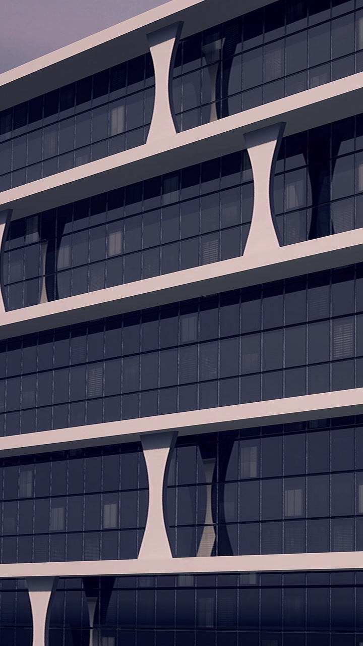 Modern building design shows interesting shape and glass structure in daylight