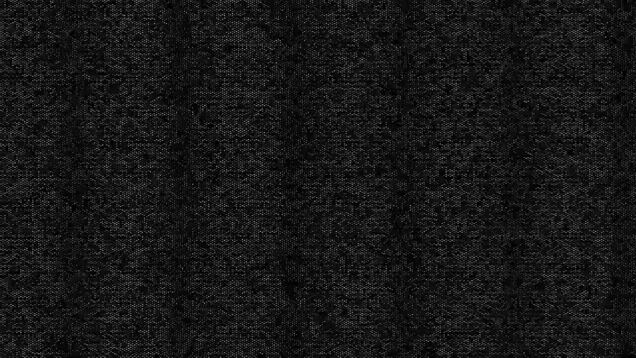 Detailní textura tmavě šedé tkané látky