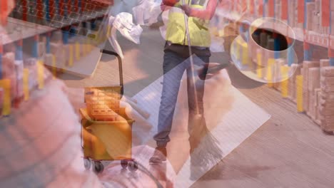 Animation-of-african-american-woman-mopping-floor-in-warehouse-over-cropped-hands-crumpling-paper