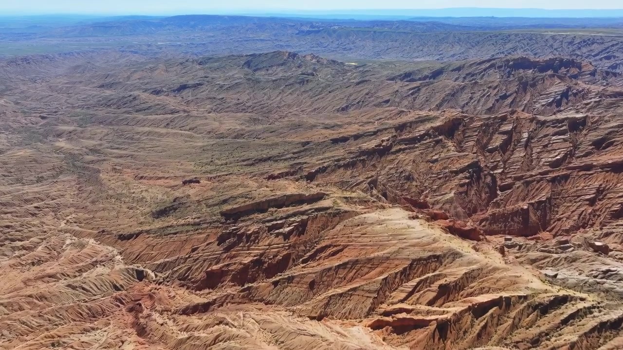Desert landscape no action static scene, in high-altitude desert environment with rugged terrain and clear, with rugged hills, sparse vegetation, with brown, blue accents, nearby objects.
