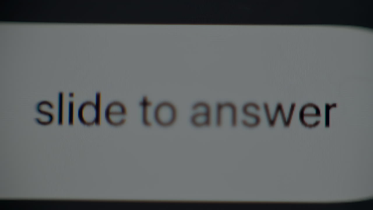 The simple process of sliding to answer an incoming call on a smartphone screen. Clear instructions and a close look at features are provided for better understanding