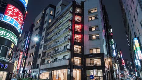 tokyo metropolitan landscape glowing with luminous neon signage, revealing architectural elegance during nocturnal cityscape, capturing vibrant urban energy in japanese metropolis
