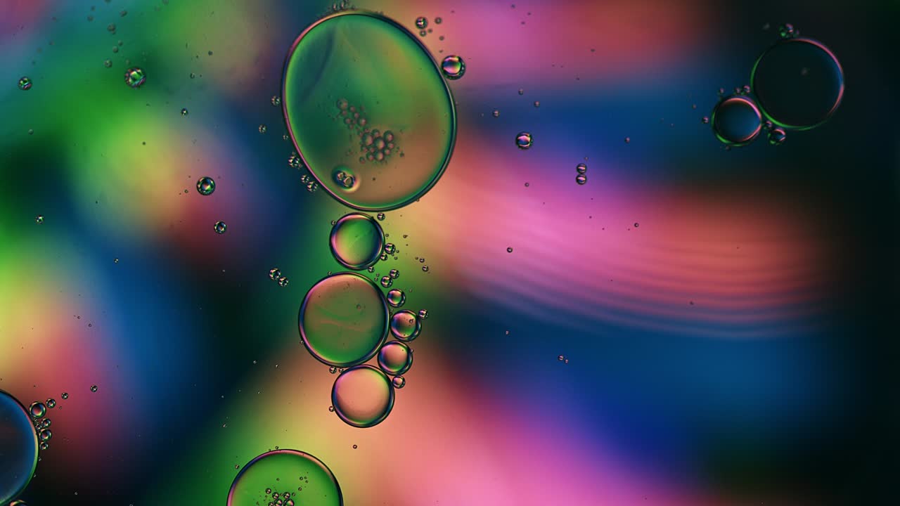 Abstract Colorful Food Oil Drops Bubbles and spheres Flowing