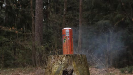 slowmotion of exploding can.
