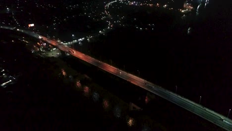 drone shot of a bridge at night