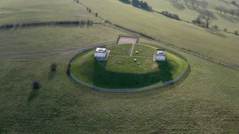 green fields on the edge of the british countryside