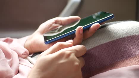 woman holding a smartphone