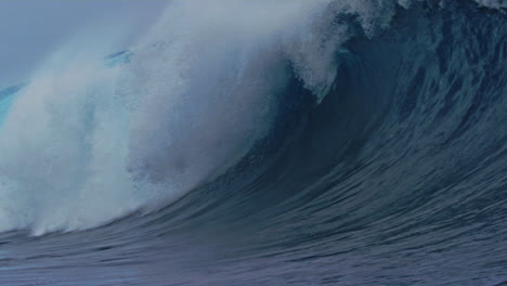 breathtaking natural beauty of ocean wave crashing into whitewash on surface of water in slow motion