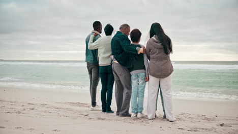 beach, grandparents and back of parents with kids