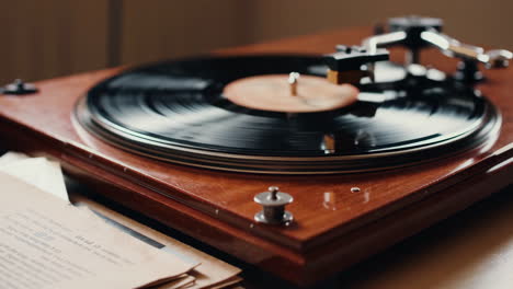 close-up of a vintage record player with a spinning vinyl record