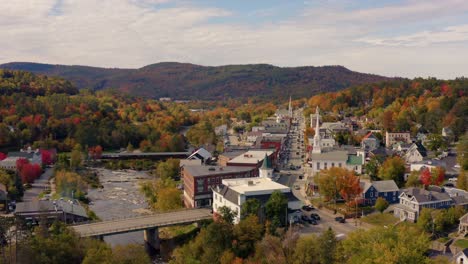 scenic town in new england during colorful fall season, aerial view