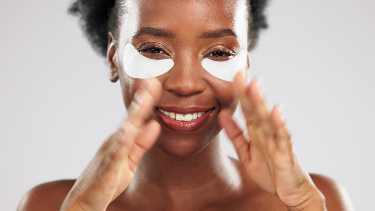 Face, skincare and happy black woman with eye mask