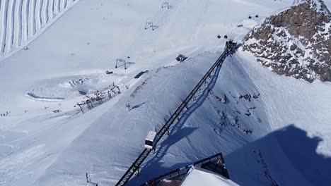 kitzsteinhorn mountain train view aerial footage austria skiing resort