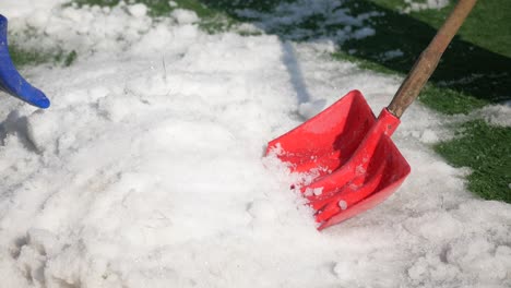 snow shoveling on artificial turf