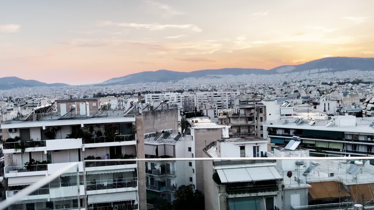 Athens Rooftop View with Sunset Over City