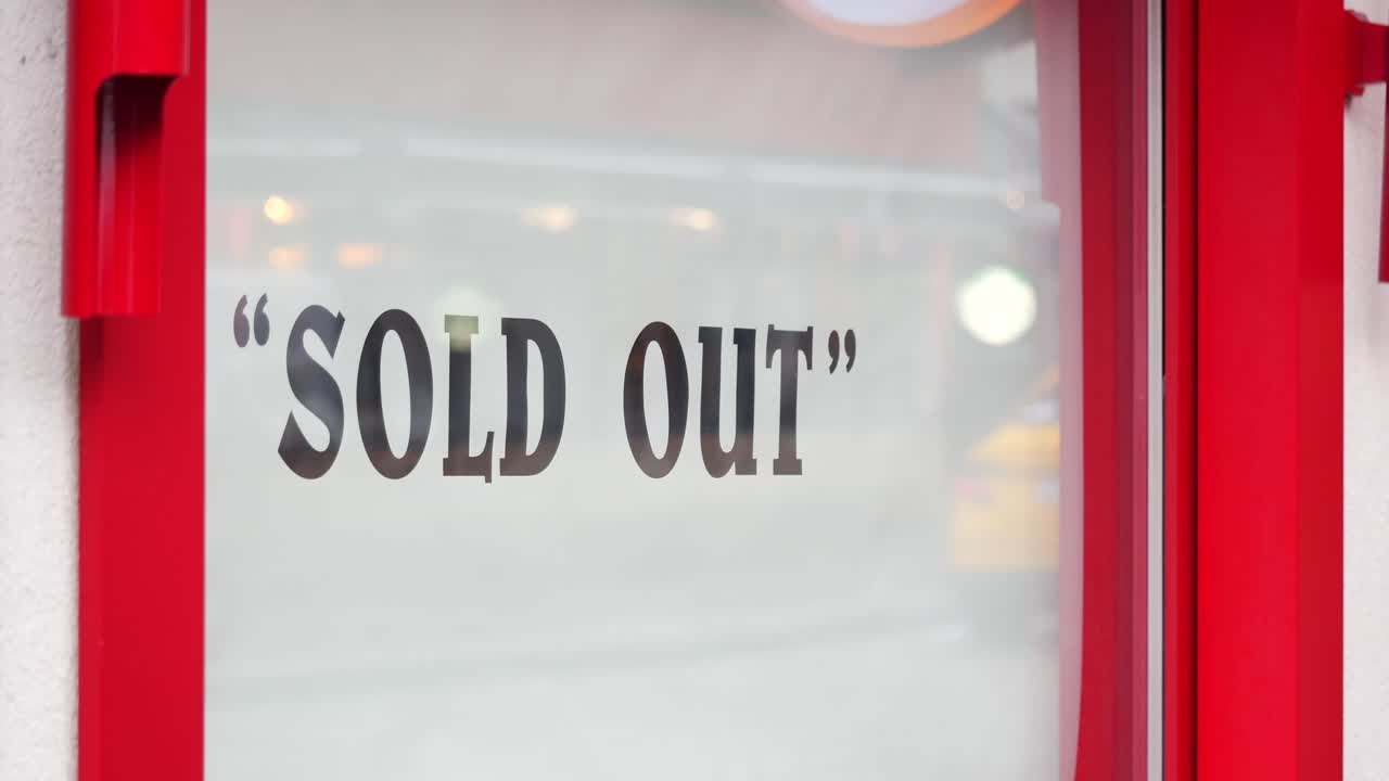 Sold Out Sign on a Store Window