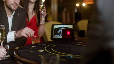 man playing poker at the casino.