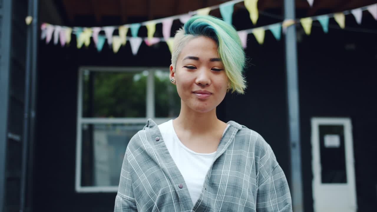 Young Woman with Vibrant Hair Outdoors