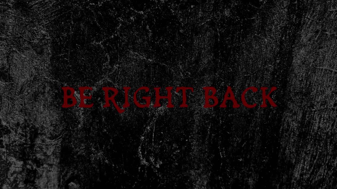 Flickering 'Be Right Back' Text on Dark Grunge Background