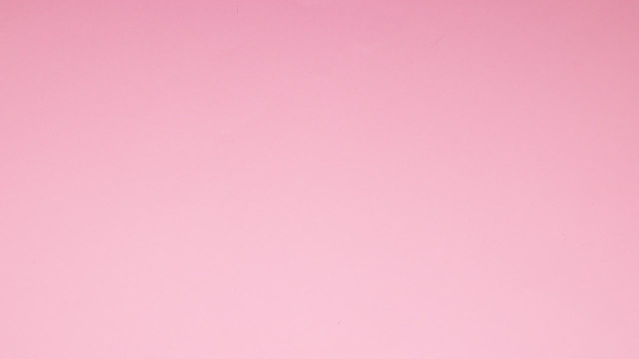 las rondas coloridas aparecen y desaparecen desde el fondo rosa - detenga el movimiento