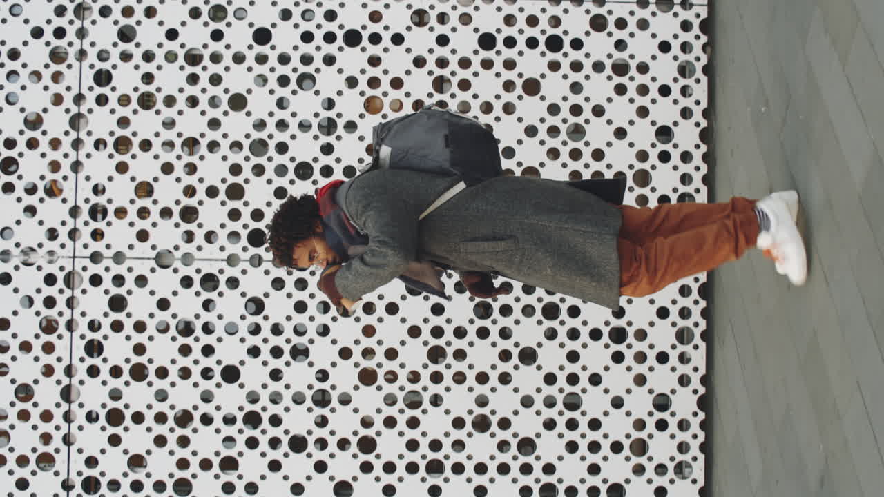 Man Walking in Urban Setting