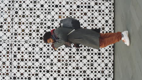 man walking in urban setting