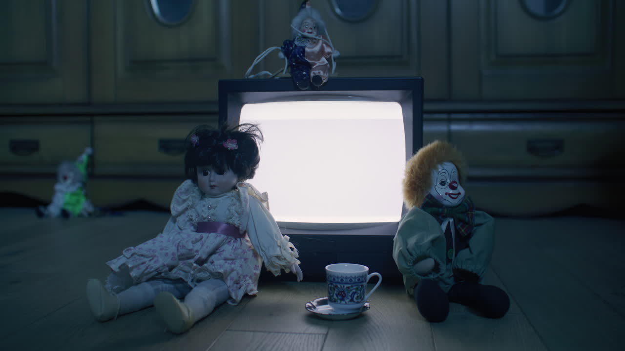 Vintage Television with Dolls and Clowns