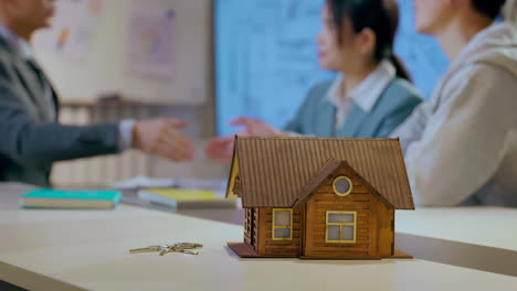 real estate ideas. woman sign mortgage contract, put signature on sale purchase rental agreement, handshaking realtor at meeting with estate agent, satisfied customers buy property, get keys new home