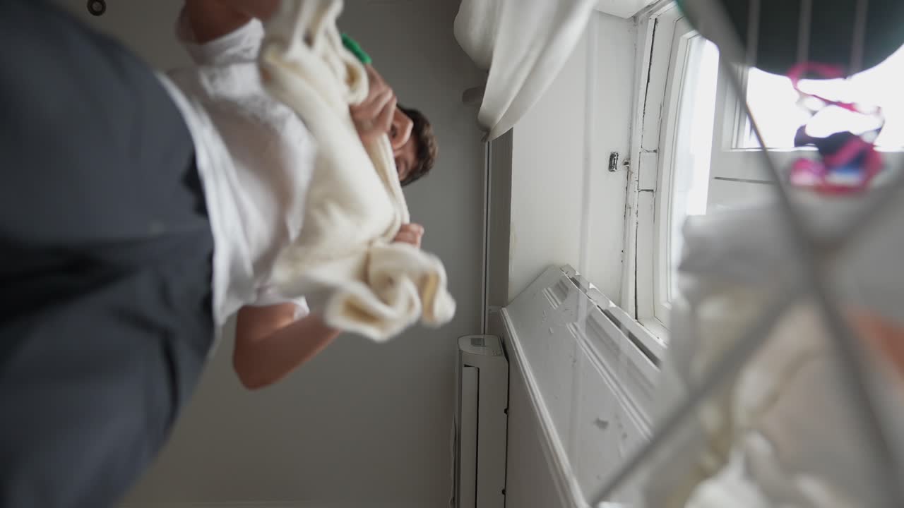 Person Drying Laundry