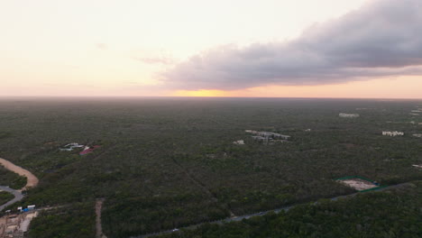 high angle view of green dense vegetation landscape with heavy clouds in sky in mexico.