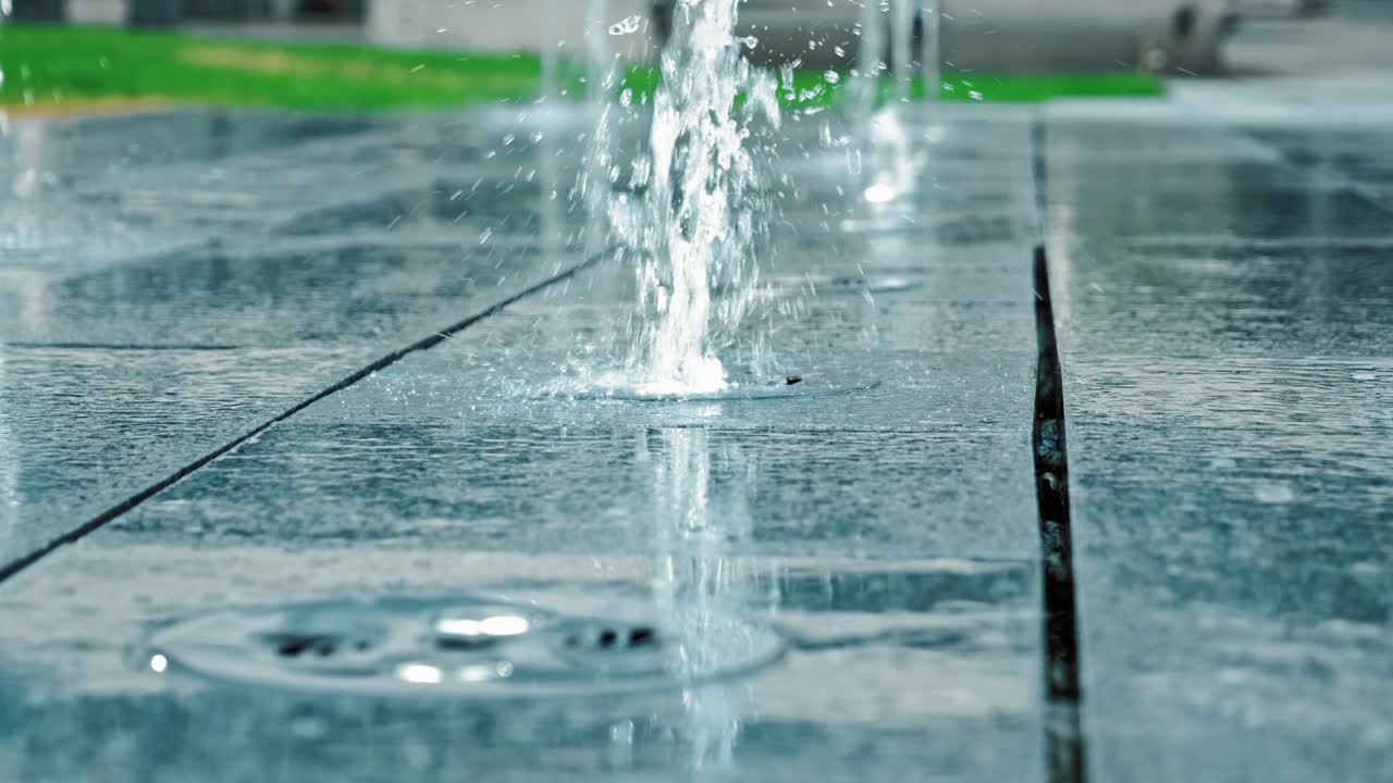City Square Sidewalk Decorative Illuminated Water Fountain Jet Sprinklers Wasting Water