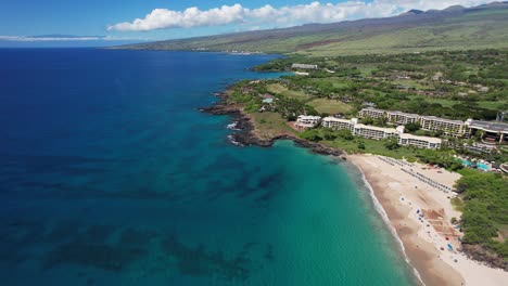 hapuna beach on big island hawaii - drone left scroll on a sunny summer day