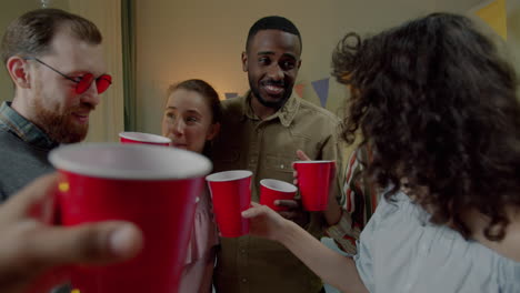 friends celebrating with red cups